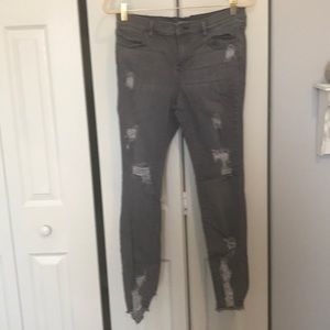 Gray distressed legging jeans
